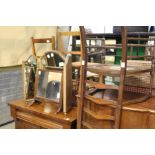 A mahogany armchair (AF) and two dressing table mirrors.