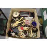 A box of miscellaneous collectables.