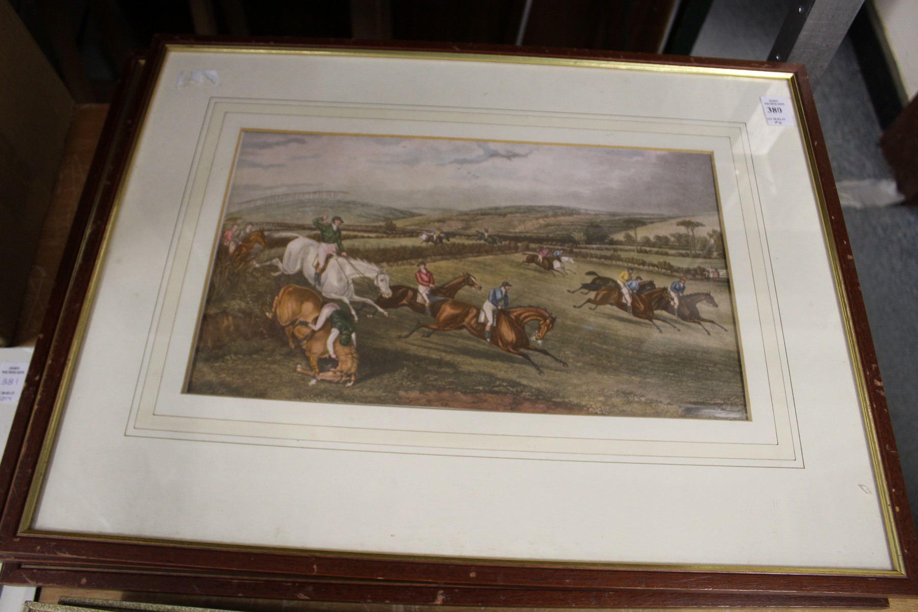 A set of four colour prints depicting steeplechase scenes.