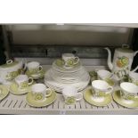 A quantity of Susie Cooper or Wedgwood Sunflower pattern china.
