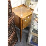 A mahogany pot cupboard.