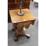 A 19th century rosewood work table.