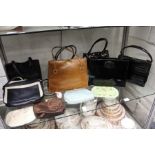 Various ladies' handbags and evening purses.