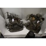 A pair of cast spelter figures of huntsmen on horseback (AF).