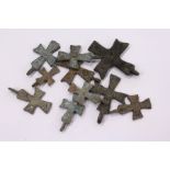 A bag of small bronze crosses.