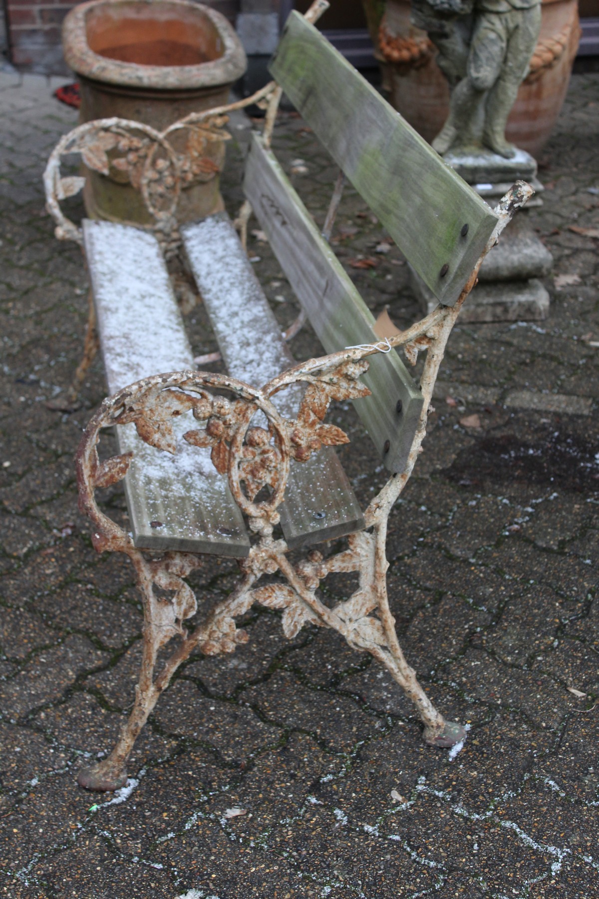 A garden bench with cast iron ends and wooden slatted back and seat. - Image 2 of 3