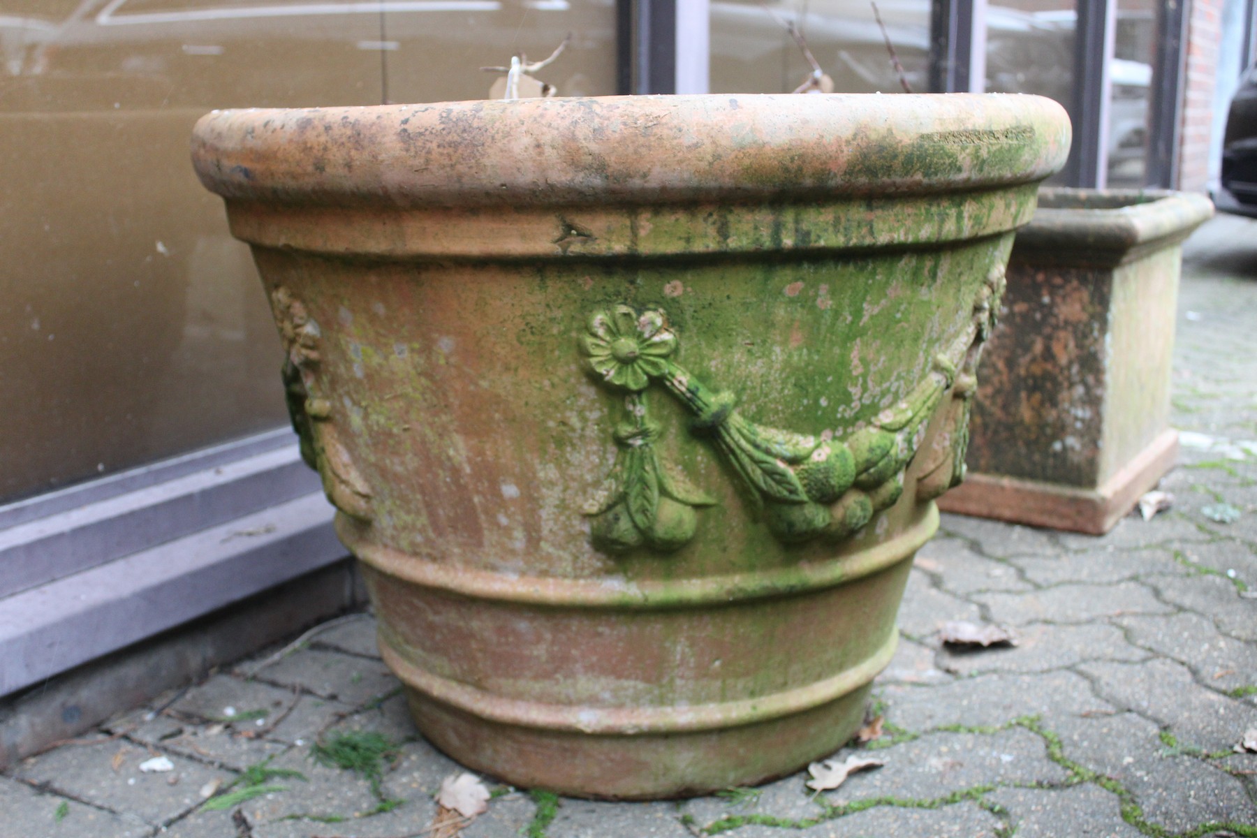 A good large circular terracotta garden planter.