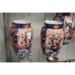 A pair of Japanese Imari ribbed vases.