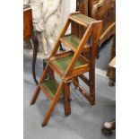 A Victorian walnut metamorphic library chair / steps.