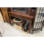 A mahogany side table.