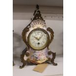 A French porcelain and ormolu mounted mantle clock.