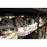 A large quantity of decorative china, a quartz clock, a mirror etc.