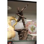 A Royal Doulton model of a cricketer.