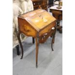 A 19th century French kingwood and marquetry inlaid bureau de dame with ormolu mounts.