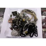 A good collection of costume necklaces and bracelets.