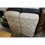 A good king size bed with a pair of zip together Somnus mattresses on box bases.