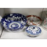 A Chinese blue and white porcelain box and cover and two bowls.