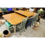 A good large varnished and painted pine kitchen table with leaf.