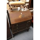 An Edwardian inlaid mahogany bureau.