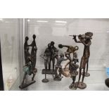 A small group of bronze and metal figures of musicians etc.