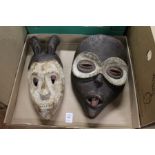 Two African masks.