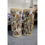 A pair of Chinese porcelain cylindrical vases.