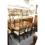 A good set of eight George III design mahogany pierced wavy ladder back dining chairs two with