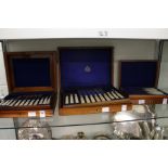 Two mahogany cased sets of mother-of-pearl handled dessert knives and forks together with a cased