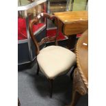 A set of four Victorian mahogany dining chairs.