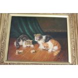 Playful Kittens oil on board, in a decorative gilt frame.