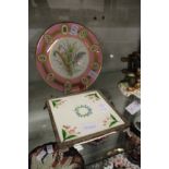 A cabinet plate, pink ground with gilt decoration, the centre painted with a floral spray,