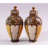 A FINE PAIR OF JAPANESE MEIJI PERIOD CLOISONNE VASES & COVERS, each vase with un=usual plain