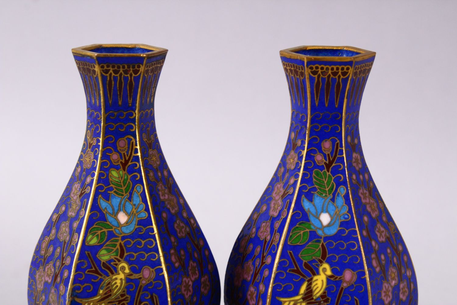 A 19TH / 20TH CENTURY CHINESE CLOISONNE VASES, with wirework depicting floral spray upon a blue - Image 5 of 6