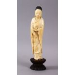 A GOOD 18TH / 19TH CENTURY CARVED IVORY FIGURE OF GUANYIN, stood holding a vessel and rosary