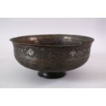 A 19TH CENTURY IRAN PERSIAN SAFAVID CALLIGRAPHIC BRONZE BOWL, with bands of calligraphy and floral