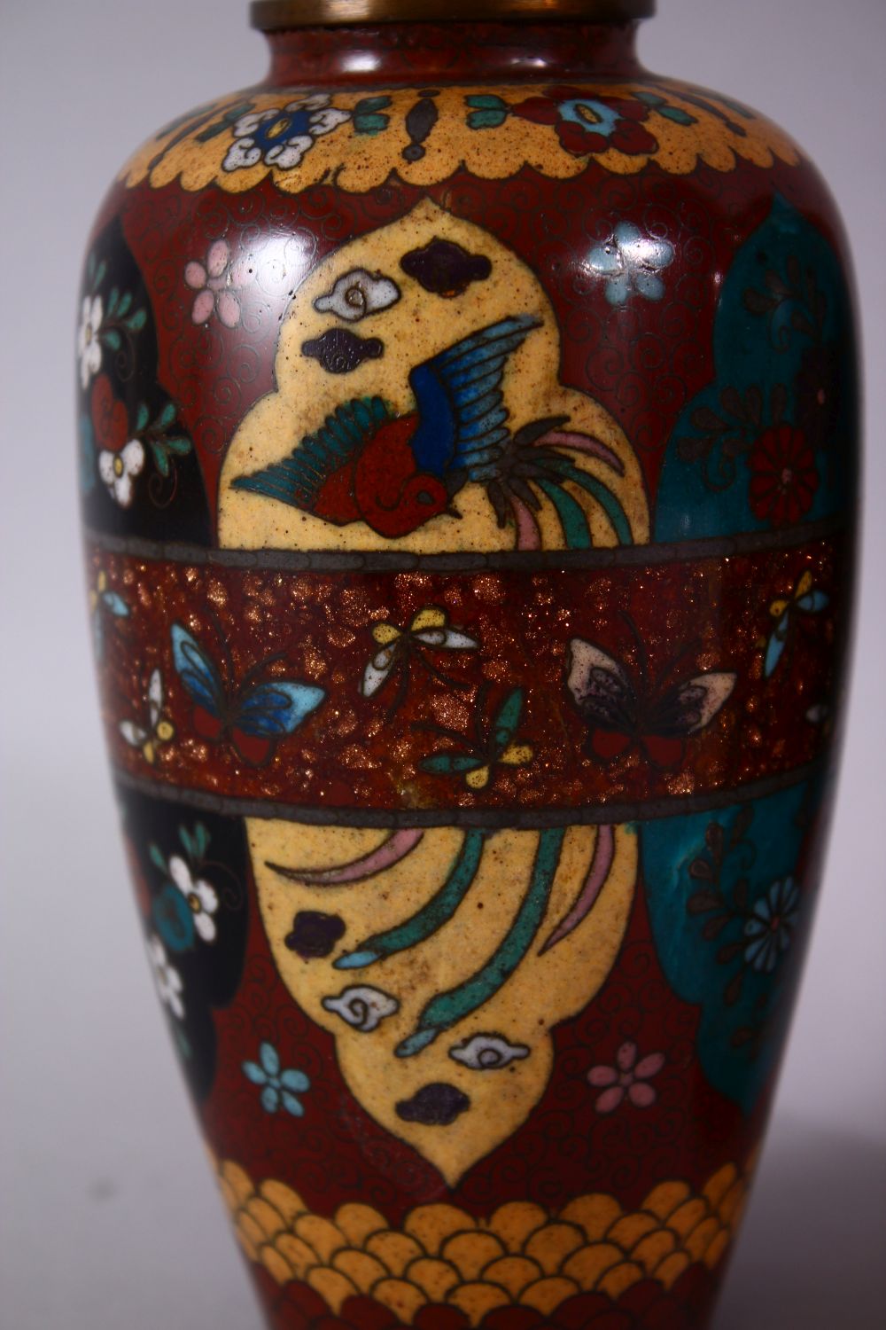 A PAIR 20TH CENTURY JAPANESE CLOISONNE VASES, red ground with panels of birds and flowers, 15cm - Image 2 of 8