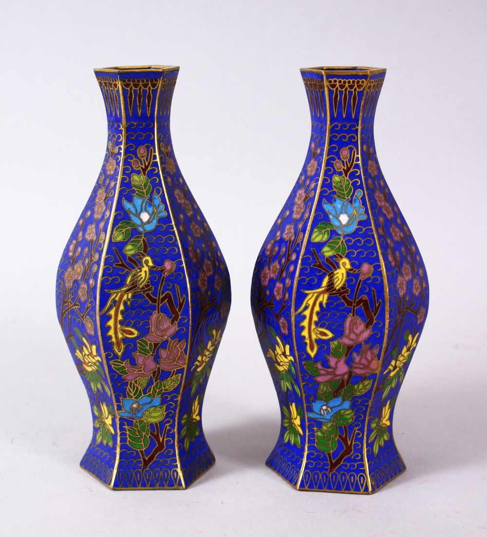 A 19TH / 20TH CENTURY CHINESE CLOISONNE VASES, with wirework depicting floral spray upon a blue