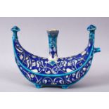 A 19TH / 20TH CENTURY IZNIK POTTERY UNUSUAL HOLY WATER FLASK, with a blue ground and white motif