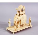 A FINELY 19TH CENTURY INDIAN CARVED IVORY ELEPHANT IN PROCESSION, 13cm high x 6.5cm. 509.