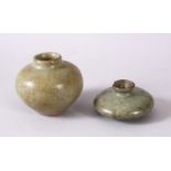 TWO EARLY POSSIBLY 12TH CENTURY CHINESE CELADON CRACKLE GLAZED BRUSH WASHERS, both with a celadon