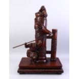 A LARGE GOOD QUALITY JAPANESE MEIJI PERIOD CARVED HARDWOOD OKIMONO - SHOKI & ONI, the okimono carved