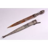 A 19TH CENTURY RUSSIAN KINJAL DAGGER with niello decoration to the scabbard and hilt, 47cm long.
