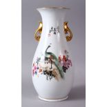 A CHINESE FAMILLE ROSE REPUBLIC STYLE PORCELAIN VASE, with twin peacock and floral decoration,