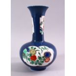 A 19TH / 20TH CENTURY CHINESE POWDER BLUE / FAMILLE VERTE PORCELAIN VASE, with panels of bouquet