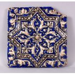 A QAJAR MOULD POTTERY TILE, 24cm square.