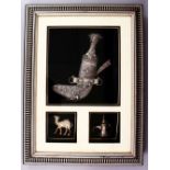 A GOOD 19TH CENTURY TURKISH KINJAL DAGGER IN A FRAME WITH A CAMEL AND OIL POURER, white metal,