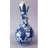 A CHINESE MING STYLE BLUE & WHITE FISH & LOTUS GARLIC HEAD VASE, With swimming fish amongst lotus