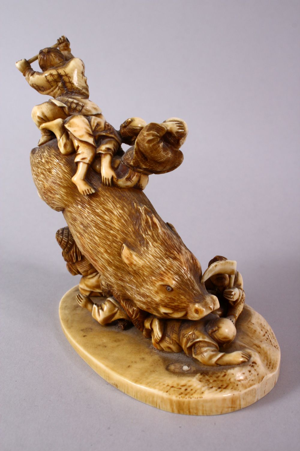 A JAPANESE MEIJI PERIOD CARVED IVORY OKIMONO GROUP- depicting a boar being attacked by numerous - Image 5 of 12