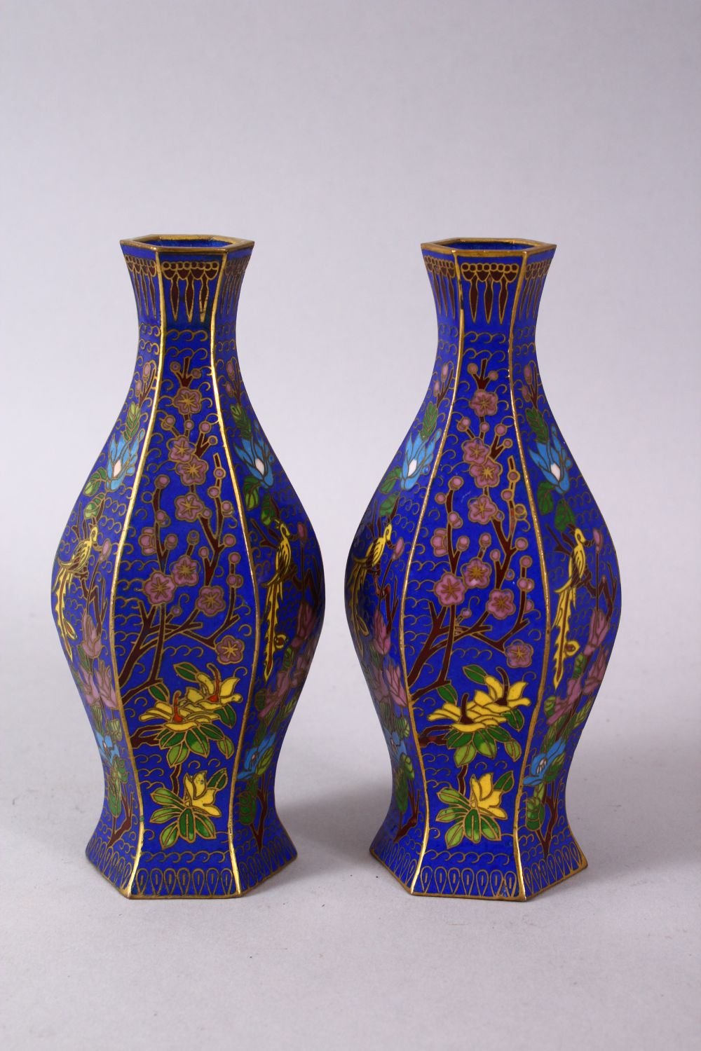 A 19TH / 20TH CENTURY CHINESE CLOISONNE VASES, with wirework depicting floral spray upon a blue - Image 4 of 6