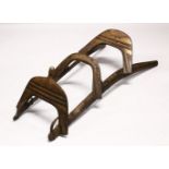 A LARGE WOOD & METAL POSSIBLY EGYPTIAN CAMEL SADDLE / SEAT, the timbers enclosed and decorated